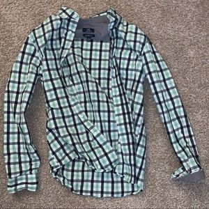 No holes or tears-all buttons intact- smoke free house